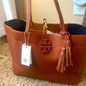 New with tags Tory Burch tote. Rich brown color. Reg $398